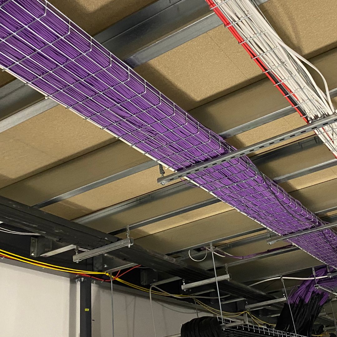 Data cabling enclosed in ceiling cages